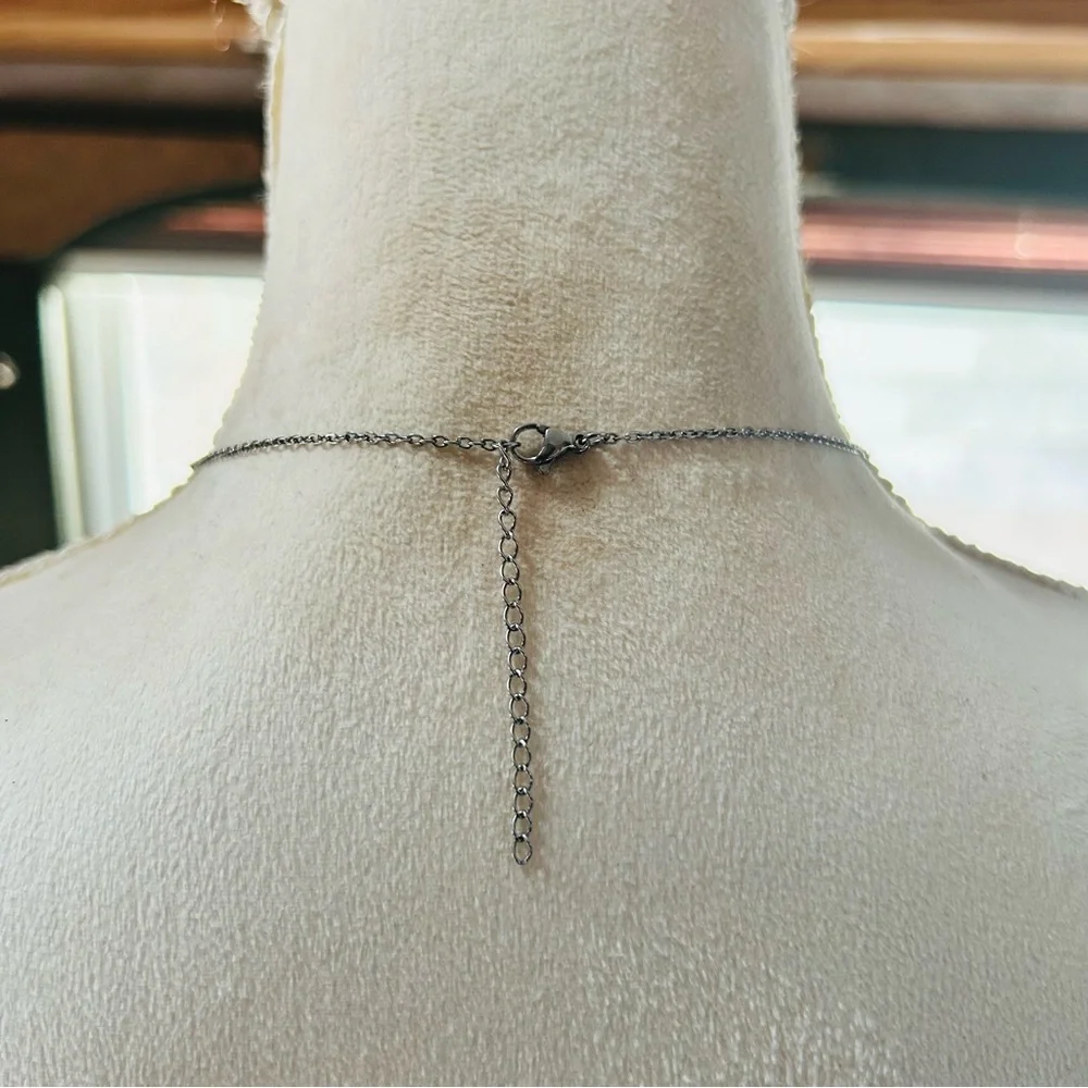Vintage articulated leg crystal man pendant on chain necklace
